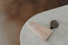 Load image into Gallery viewer, aluminum tube key malezia moisturizer 
